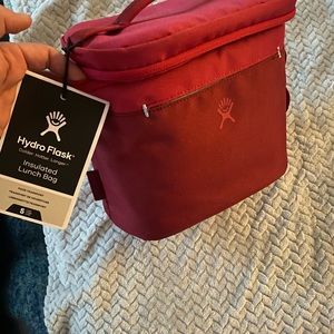 Brand new hyrdoflask lunch bag. I needed a different size. Never been used.